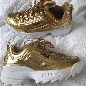 Gold FILA Disruptors